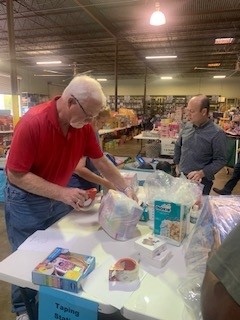 ICD Corporate Team preparing gifts at BEAR Houston.